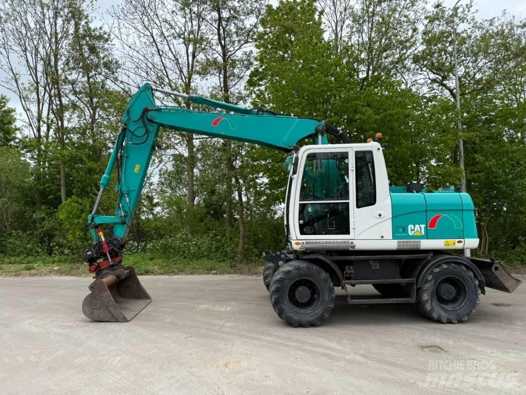 CAT M 313 D Ekskavatori uz riteņiem