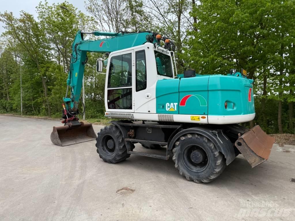 CAT M 313 D Ekskavatori uz riteņiem