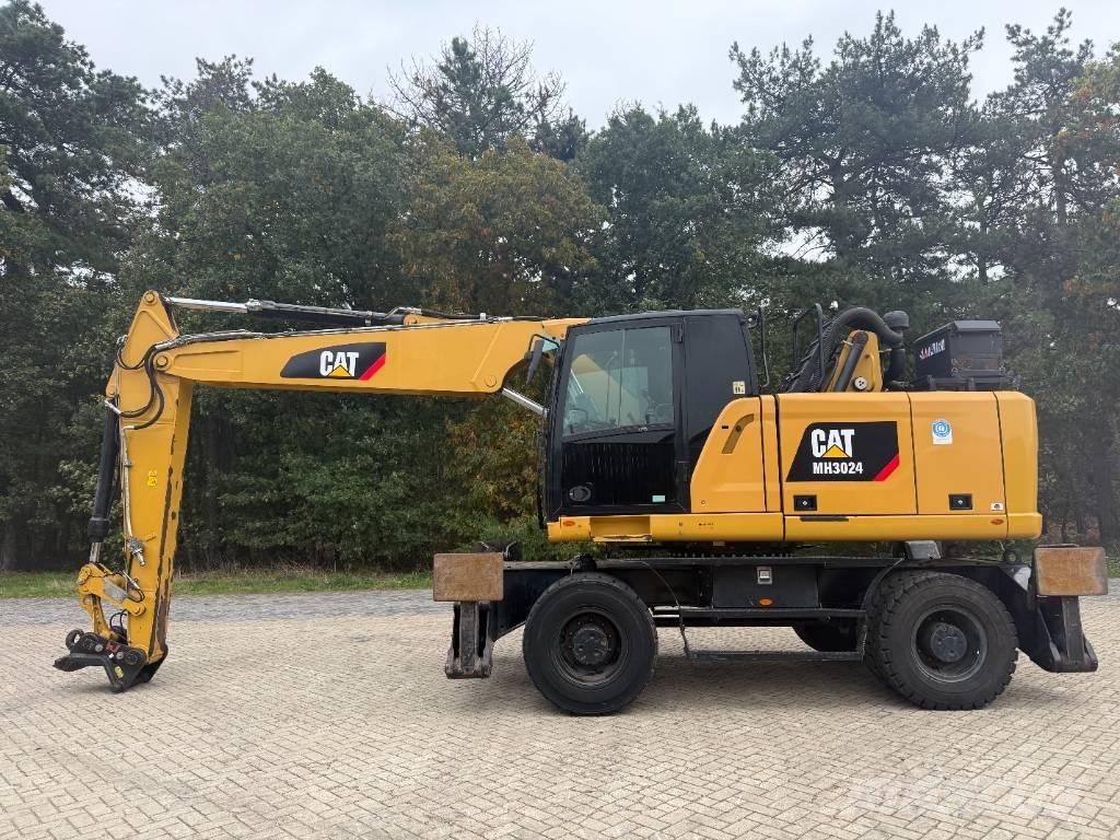 CAT MH 3024 Ekskavatori uz riteņiem