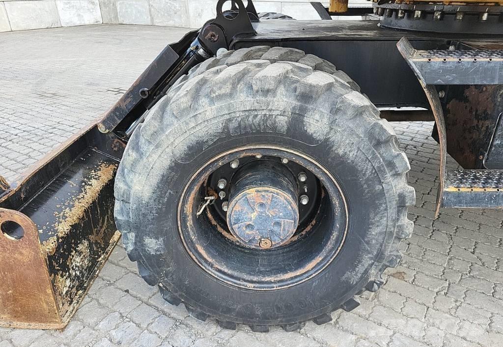 CAT M313 D Ekskavatori uz riteņiem