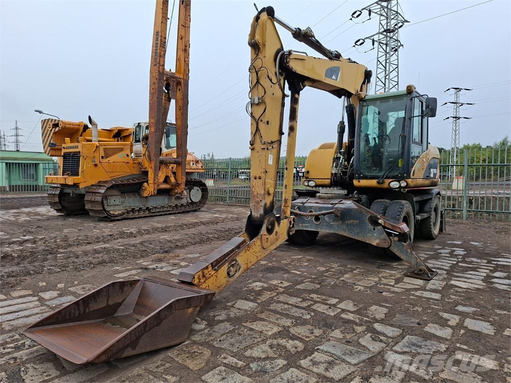 CAT M313D 4X4 Būvniecība- Citi