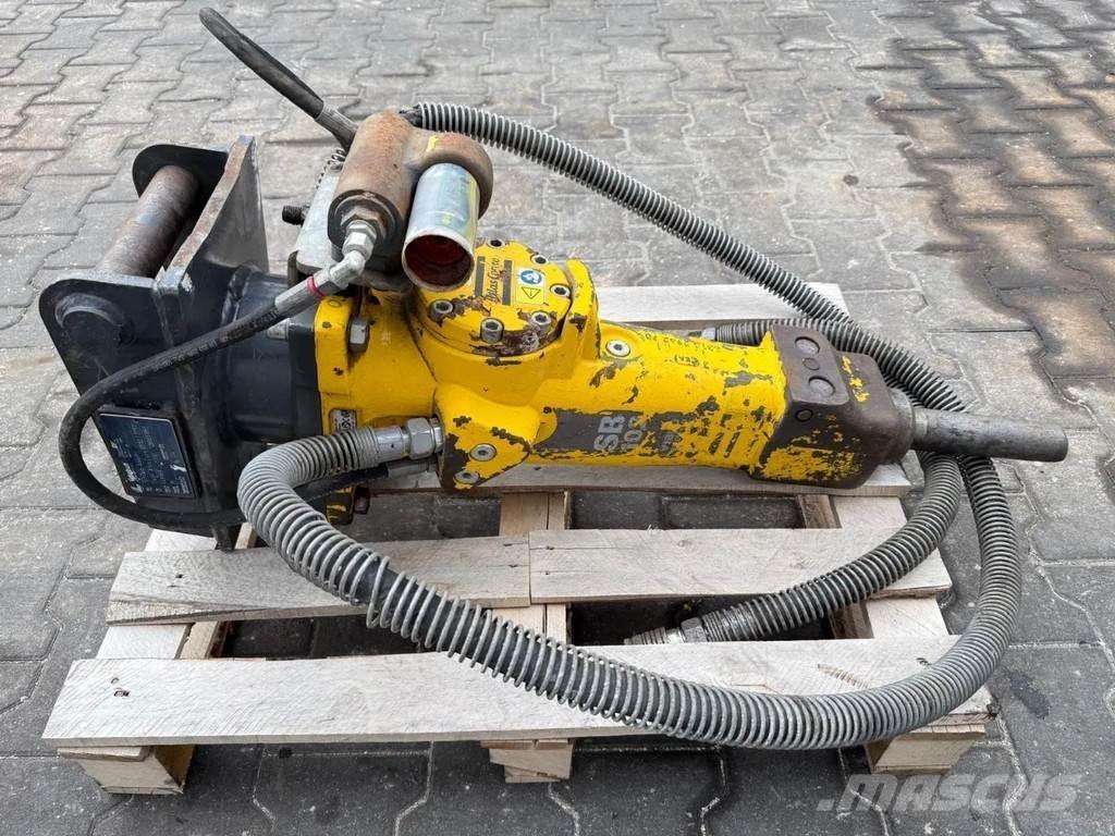Atlas Copco SB102 Āmuri/Drupinātāji