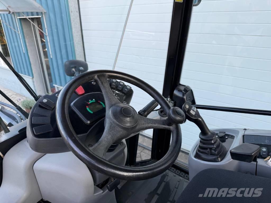 CAT 907 H Iekrāvēji uz riteņiem