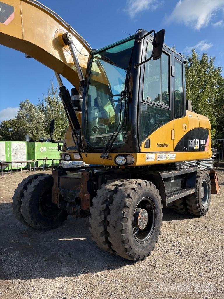 CAT M 313 D Mono Ekskavatori uz riteņiem