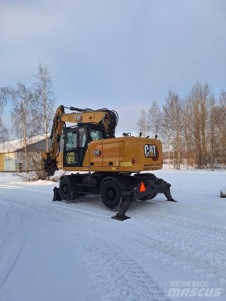 CAT M 318 Ekskavatori uz riteņiem