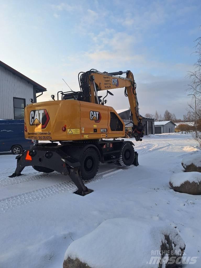 CAT M 318 Ekskavatori uz riteņiem