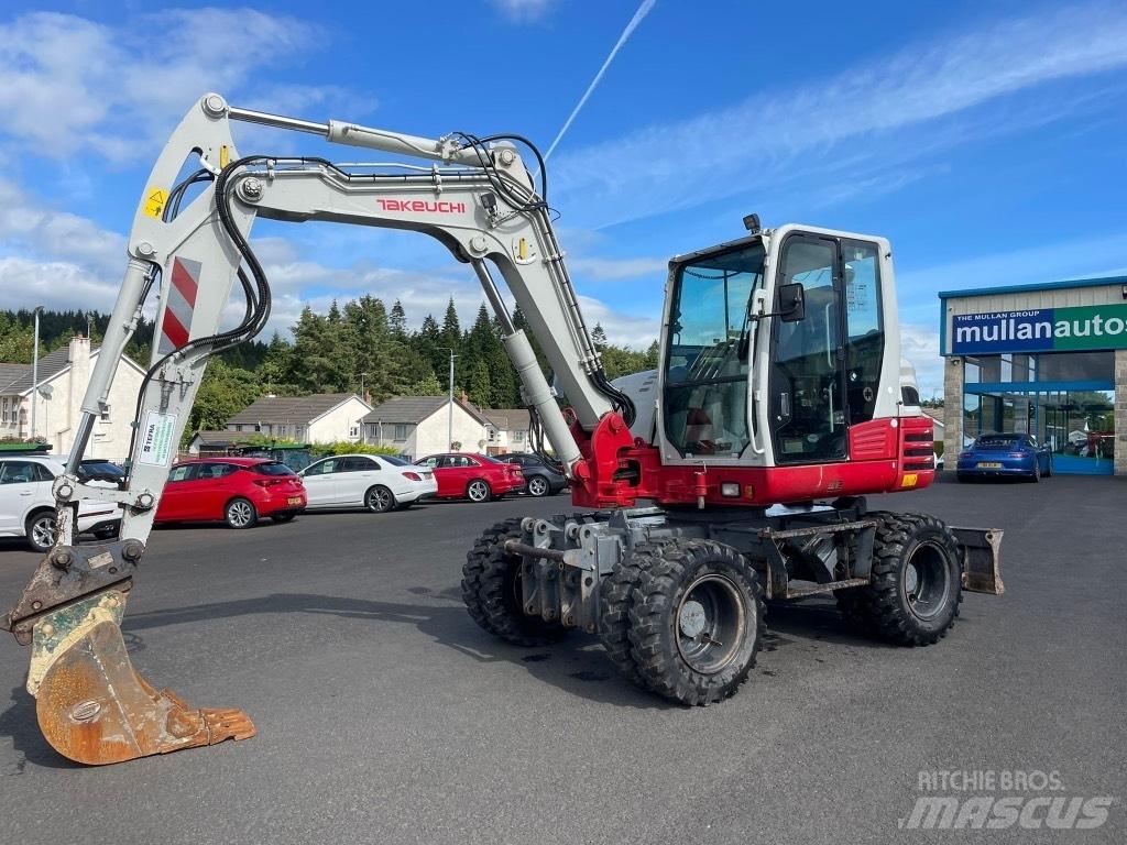 Takeuchi TB295W Ekskavatori uz riteņiem