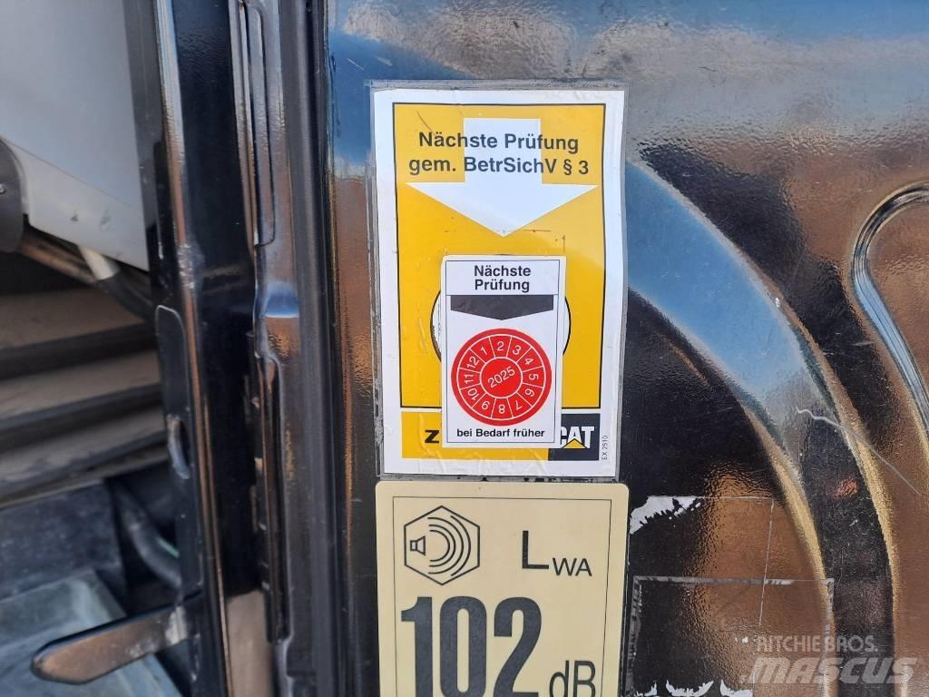 CAT M 313D Ekskavatori uz riteņiem