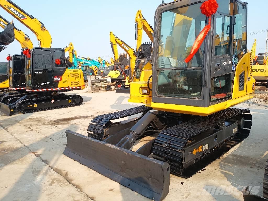 Komatsu PC 70 Vidēja lieluma ekskavatori 7 t - 12 t