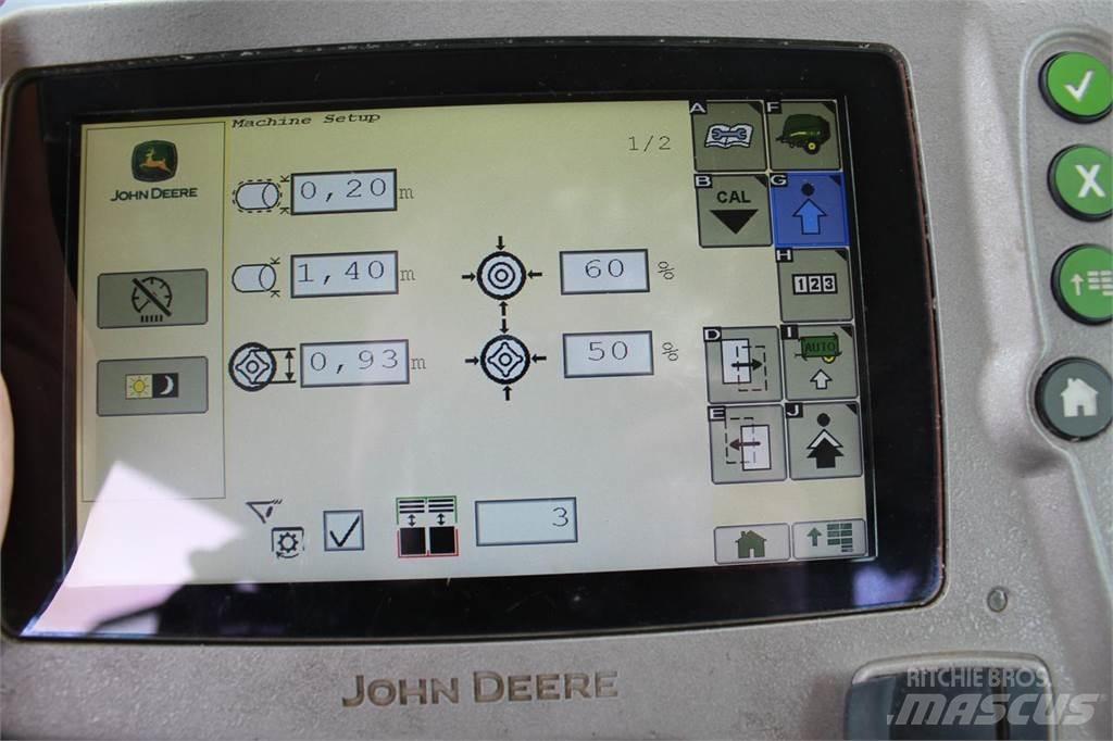 John Deere 990 Rituļu preses