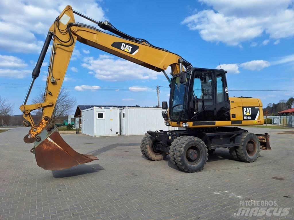 CAT M 316 D Ekskavatori uz riteņiem