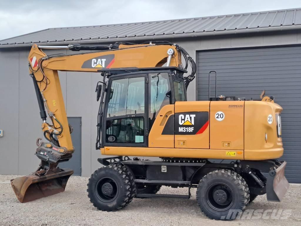 CAT M318F Ekskavatori uz riteņiem