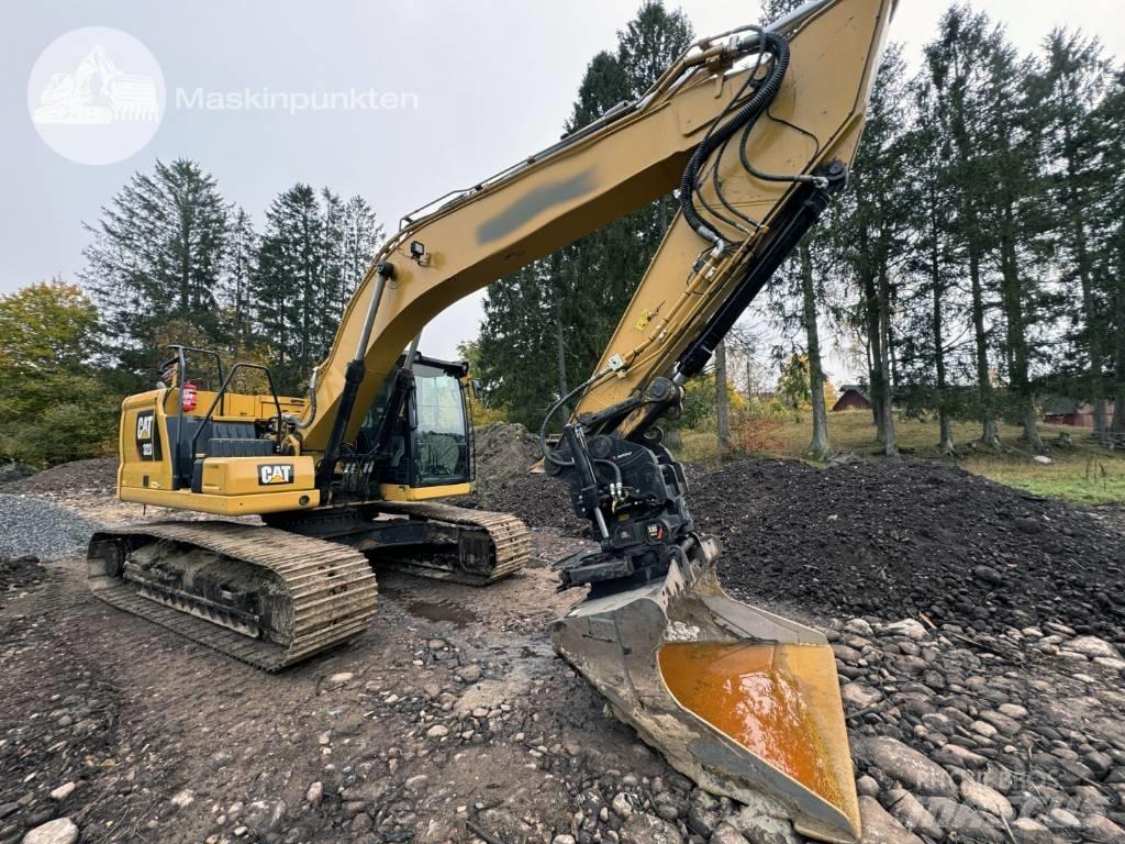 CAT 323 Kāpurķēžu ekskavatori