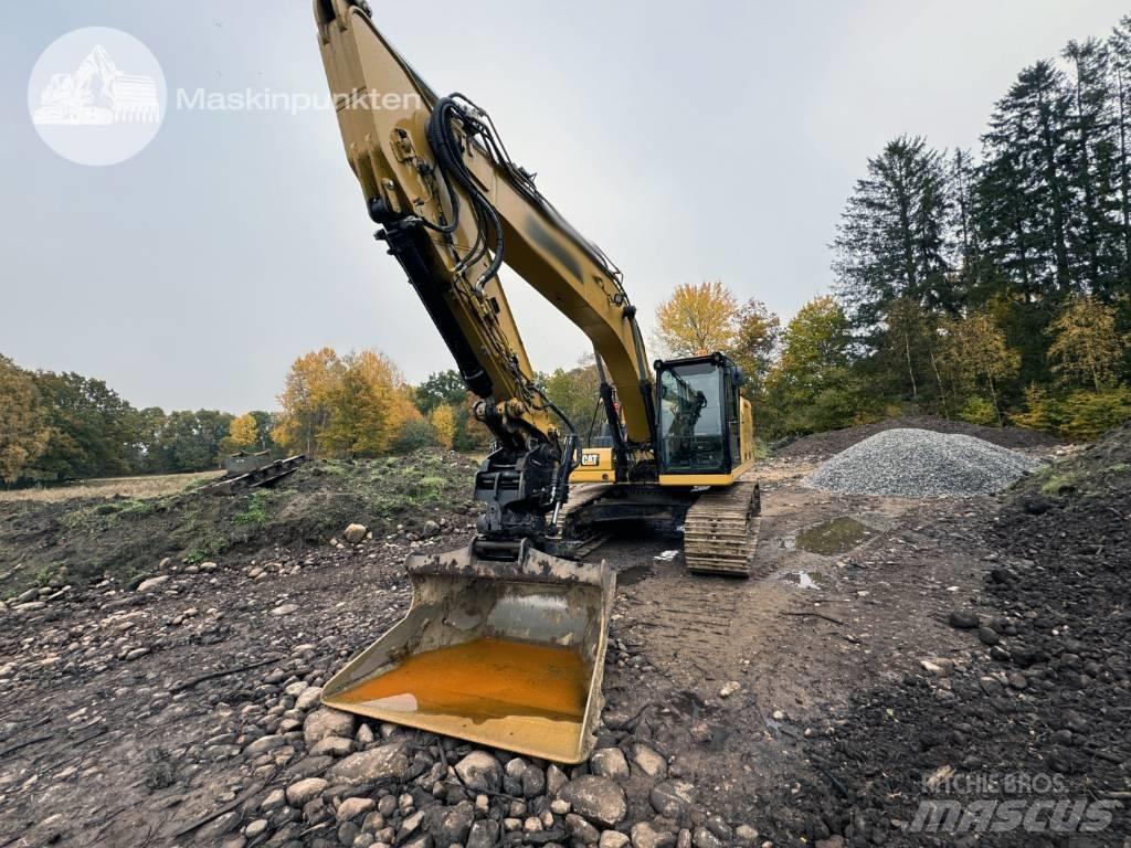CAT 323 Kāpurķēžu ekskavatori