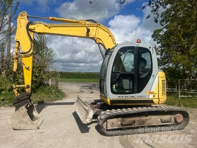 New Holland E 70 SR Vidēja lieluma ekskavatori 7 t - 12 t