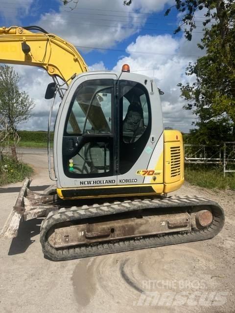 New Holland E 70 SR Vidēja lieluma ekskavatori 7 t - 12 t