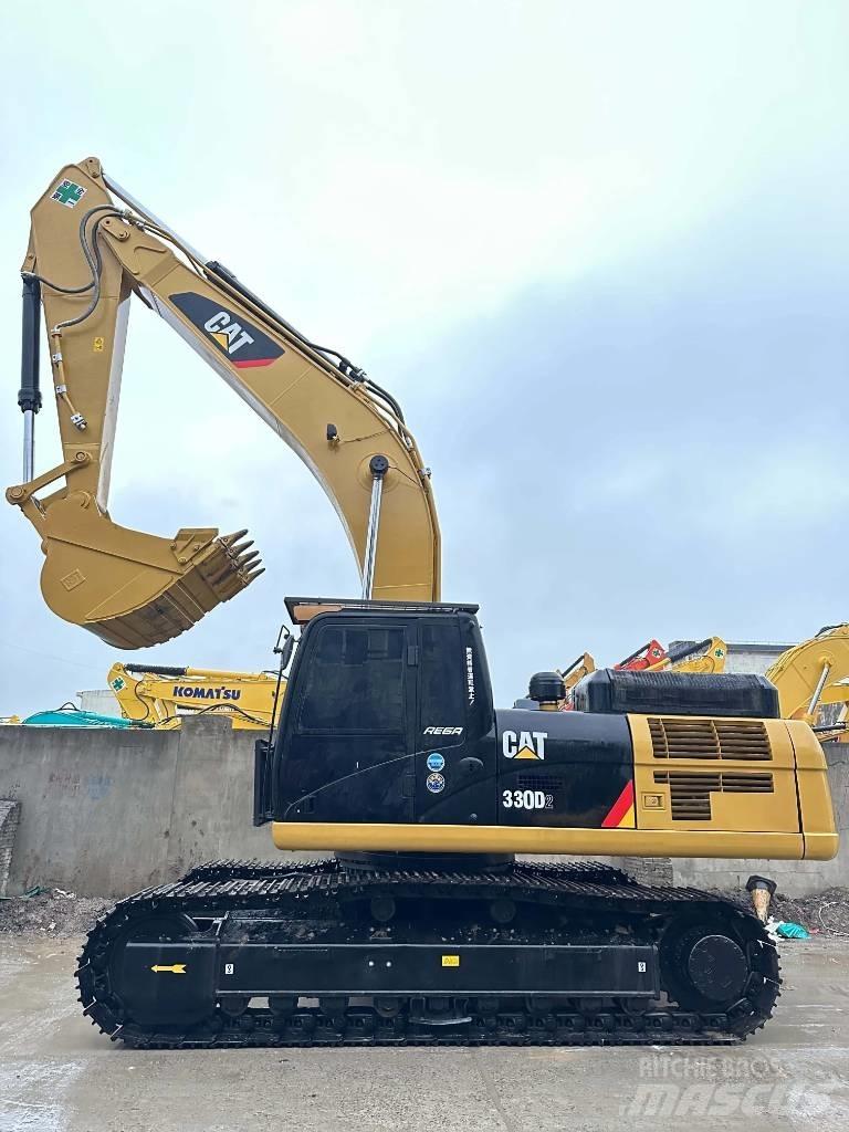 CAT 330 D2 Vidēja lieluma ekskavatori 7 t - 12 t