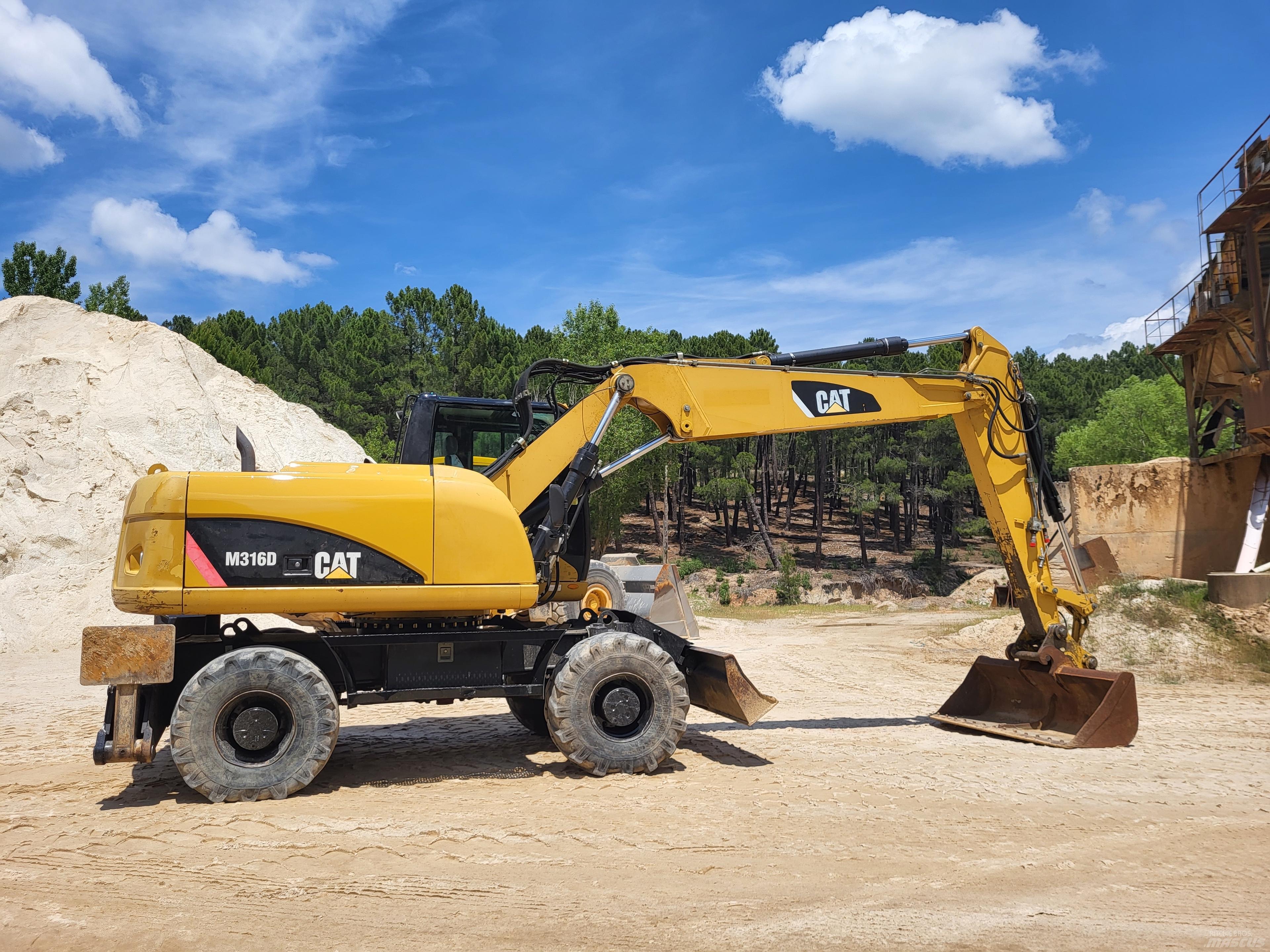 CAT 316d Ekskavatori uz riteņiem