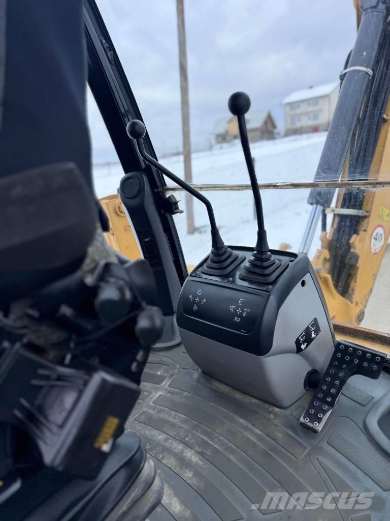 CAT 428 E Ekskavatori-iekrāvēji