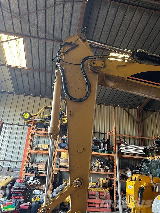 CAT M322D VAH Ekskavatori uz riteņiem