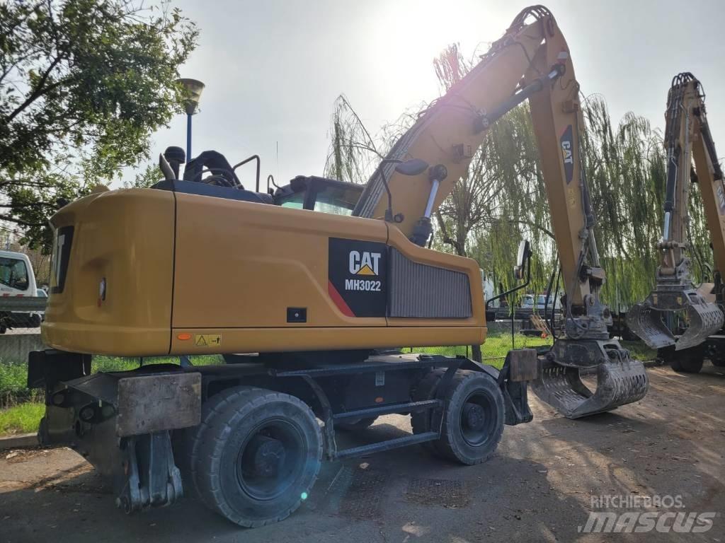 CAT mh3022 Ekskavatori uz riteņiem