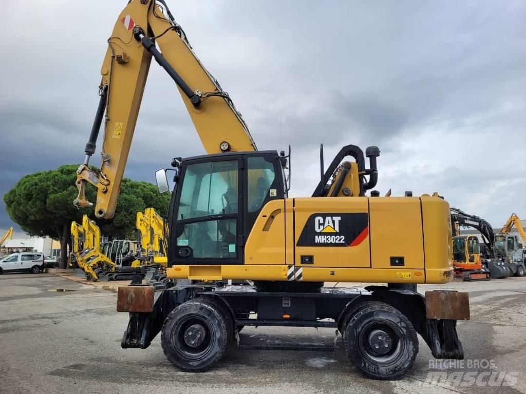 CAT mh3022 Ekskavatori uz riteņiem