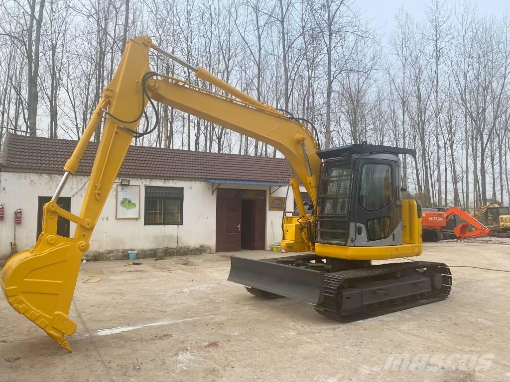 Komatsu PC128US Kāpurķēžu ekskavatori
