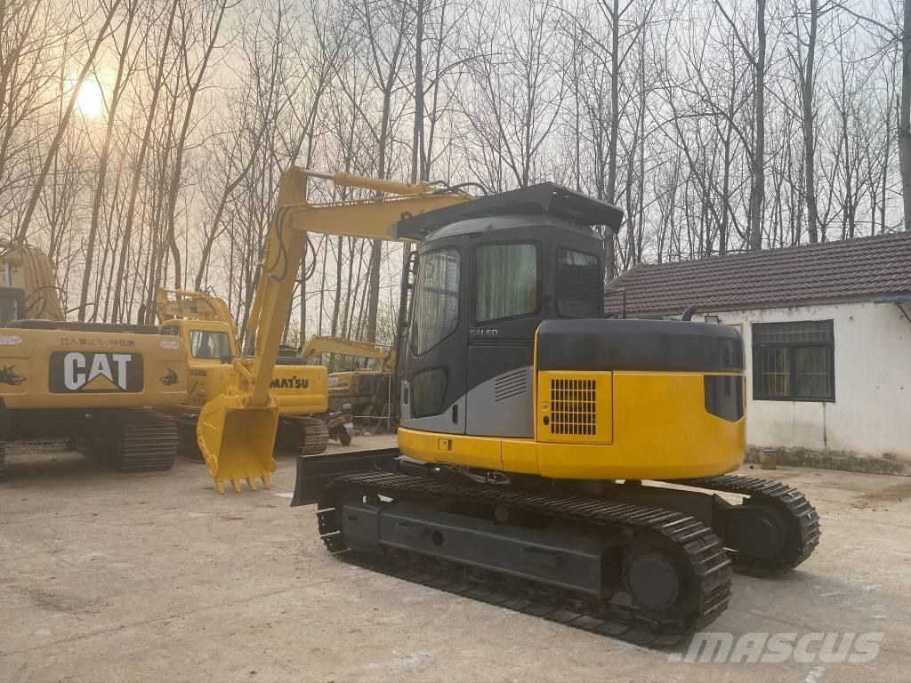 Komatsu PC128US Kāpurķēžu ekskavatori