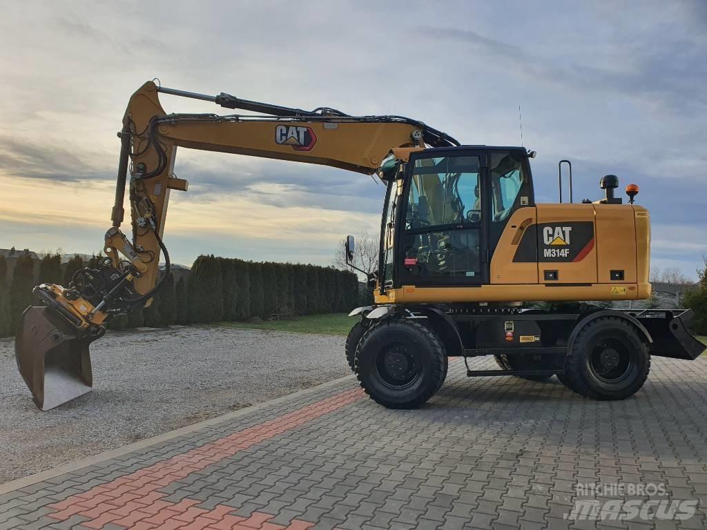 CAT M 314 F Ekskavatori uz riteņiem