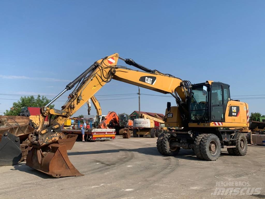CAT M 318 F Ekskavatori uz riteņiem