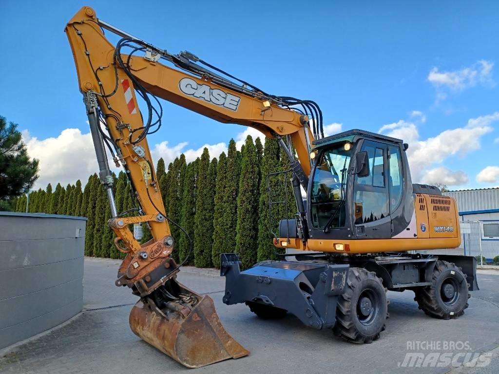 CASE WX 148 Ekskavatori uz riteņiem