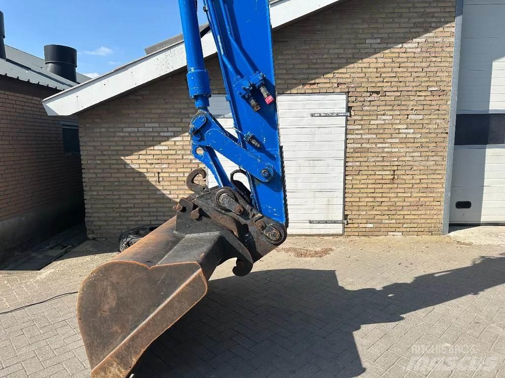 CAT M315 Ekskavatori uz riteņiem