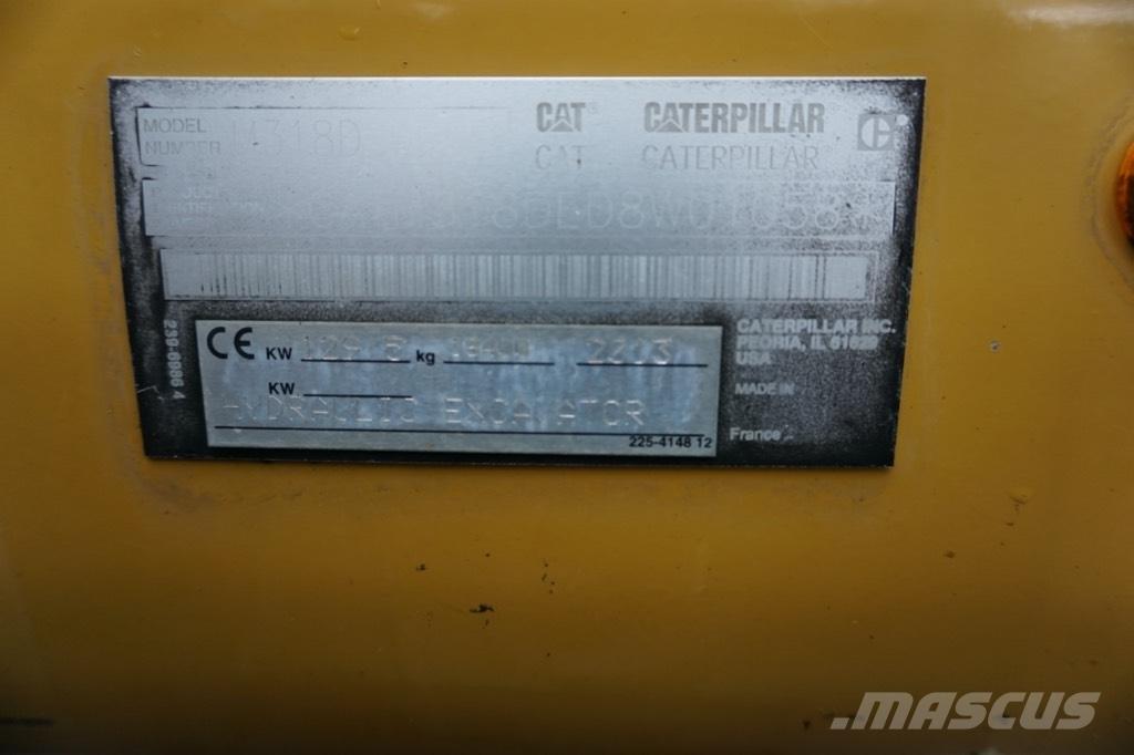CAT M 318 D Ekskavatori uz riteņiem