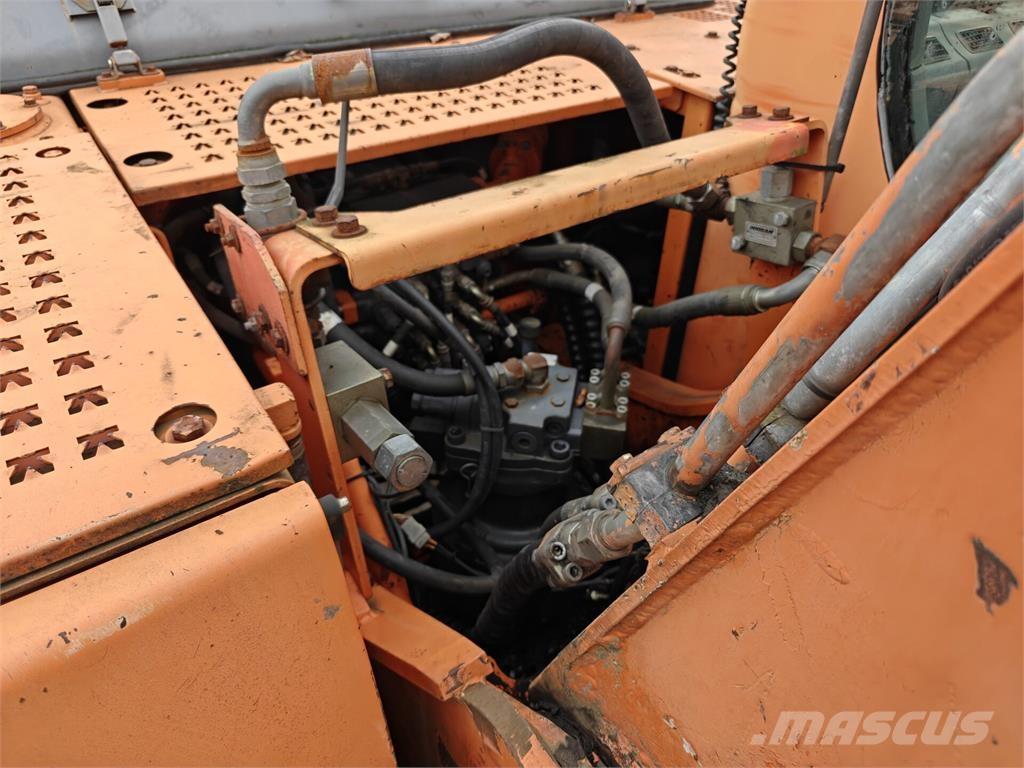 Doosan DX 225 LC Ekskavatori tālās sniedzamības darbiem