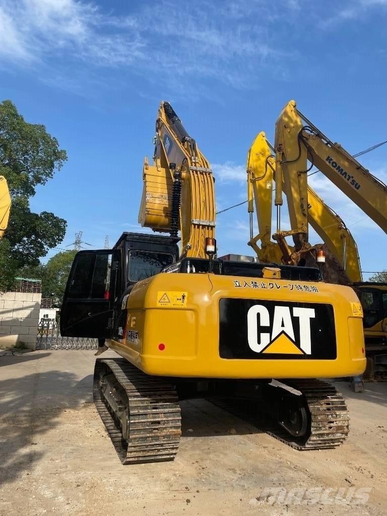 CAT 330 Vidēja lieluma ekskavatori 7 t - 12 t