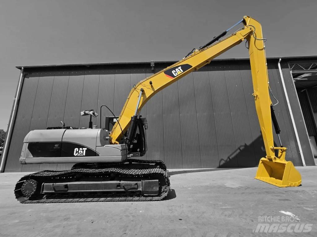 CAT 323 NG 18m Set Grāvju arkls
