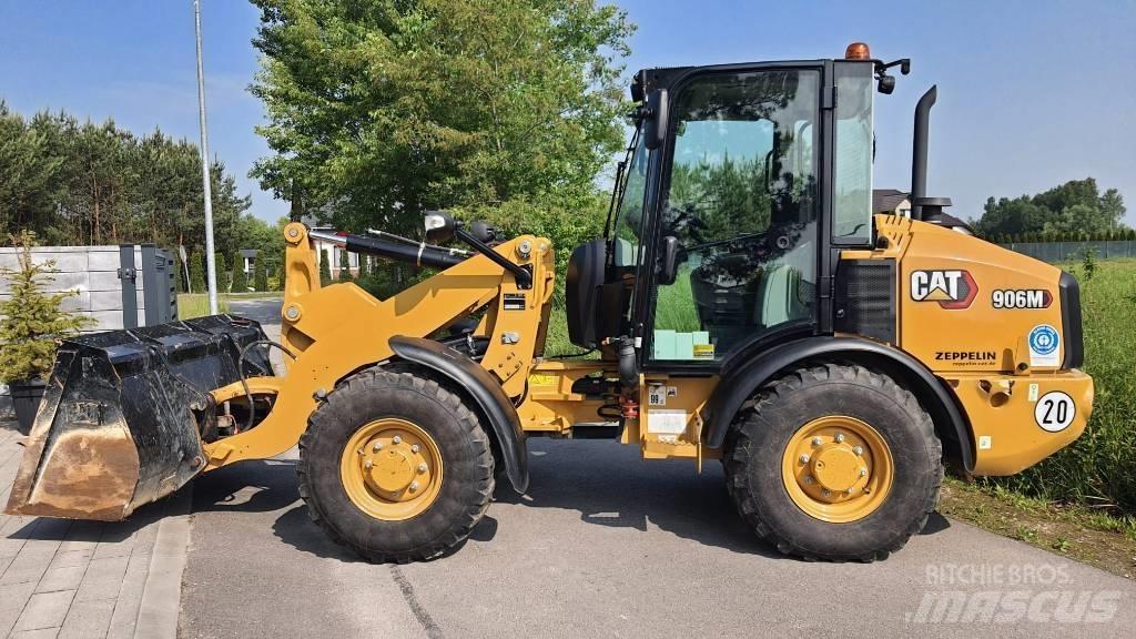 CAT 906M Iekrāvēji uz riteņiem