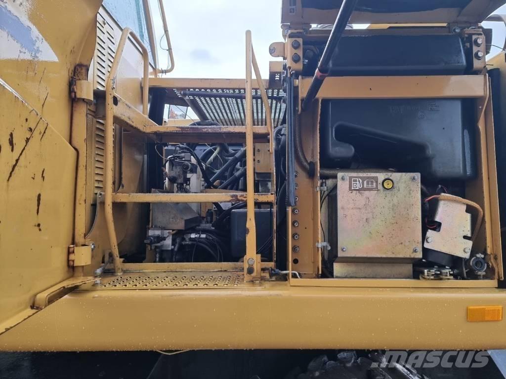 CAT M 313 C Ekskavatori uz riteņiem