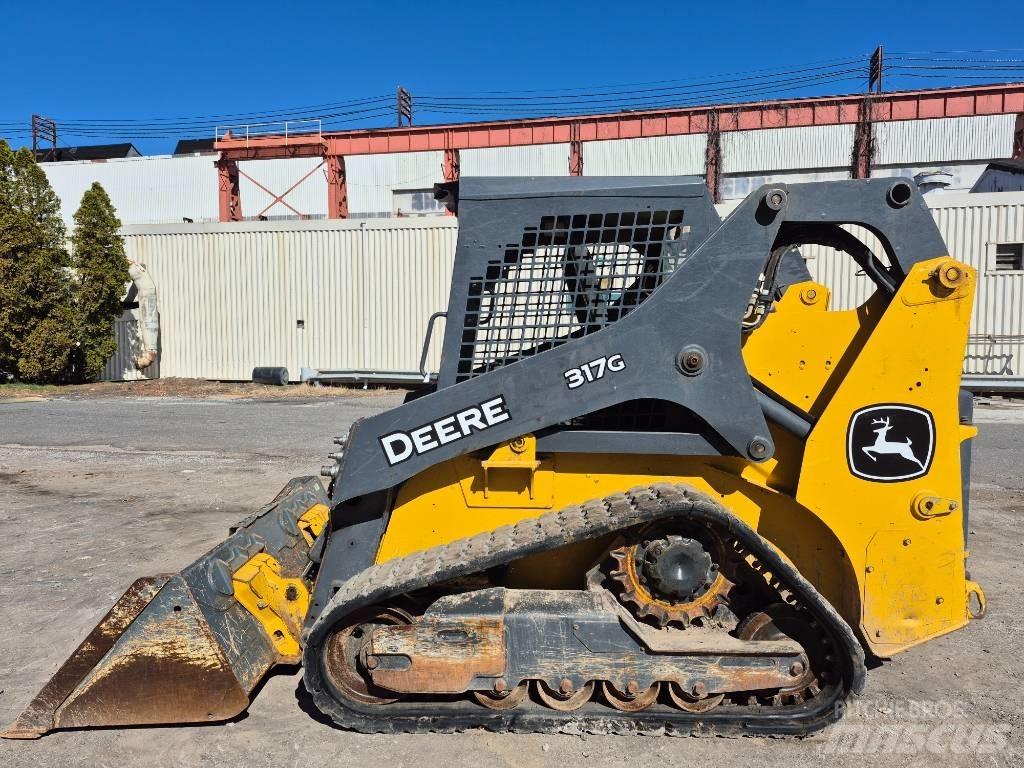 John Deere 317 Lietoti riteņu kompaktiekrāvēji