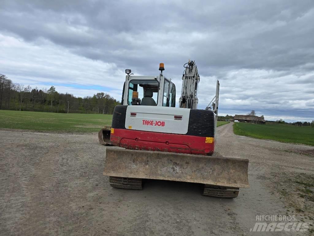 Take-Job 1140 Kāpurķēžu ekskavatori