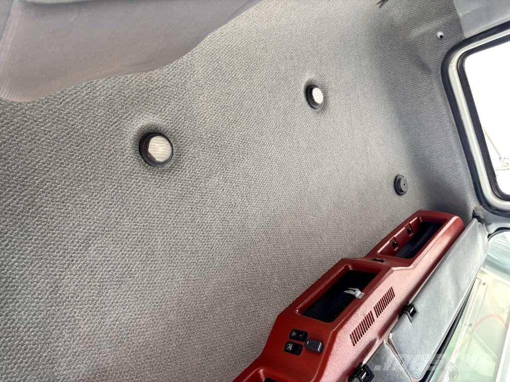 Mack CHU 613 Evakuators ar manipulatoru