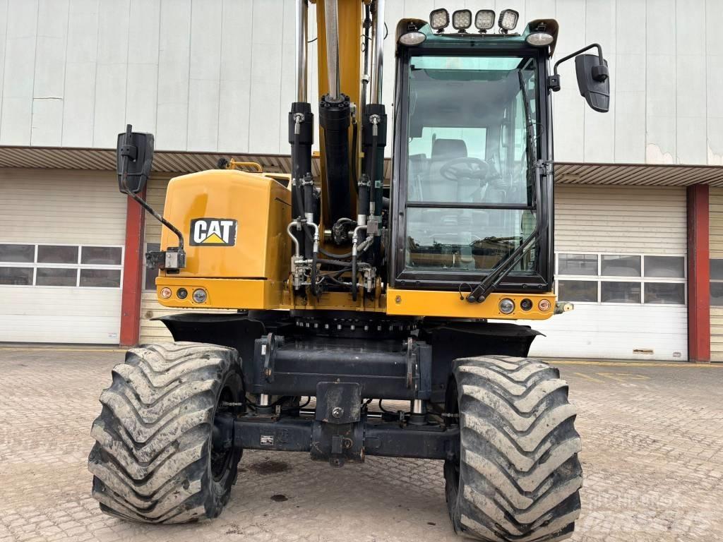 CAT M 318 F Ekskavatori uz riteņiem