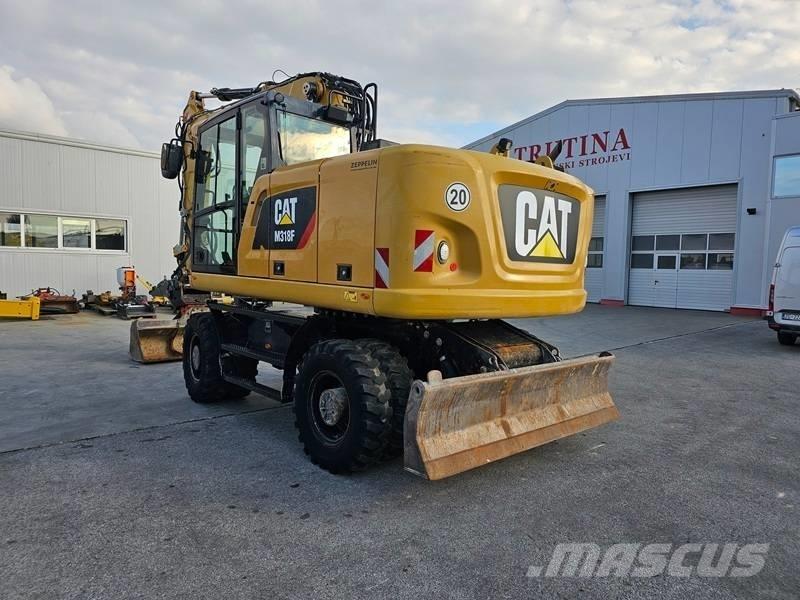 CAT M 318 F Ekskavatori uz riteņiem