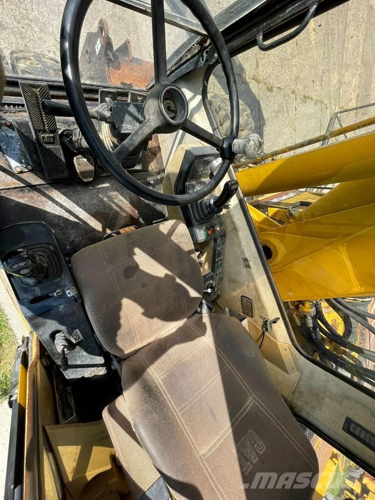 CAT M 315 Ekskavatori uz riteņiem