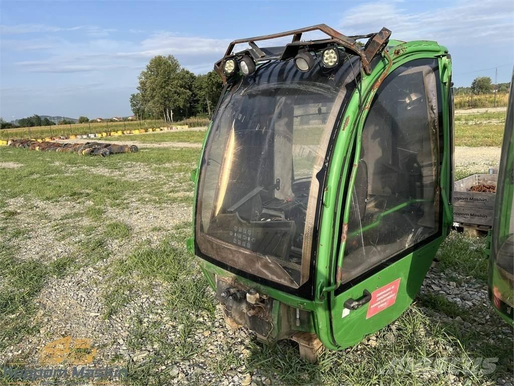John Deere 1010E Kabīnes un interjers