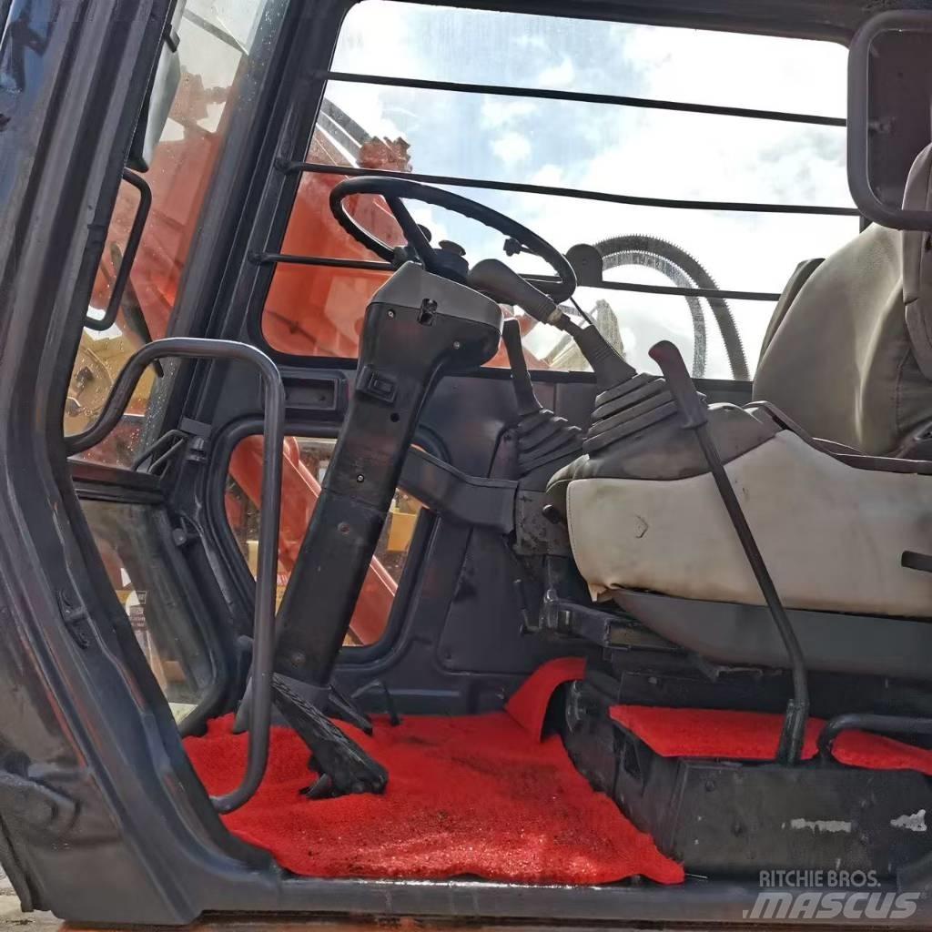 Hitachi EX 100 W D Ekskavatori uz riteņiem