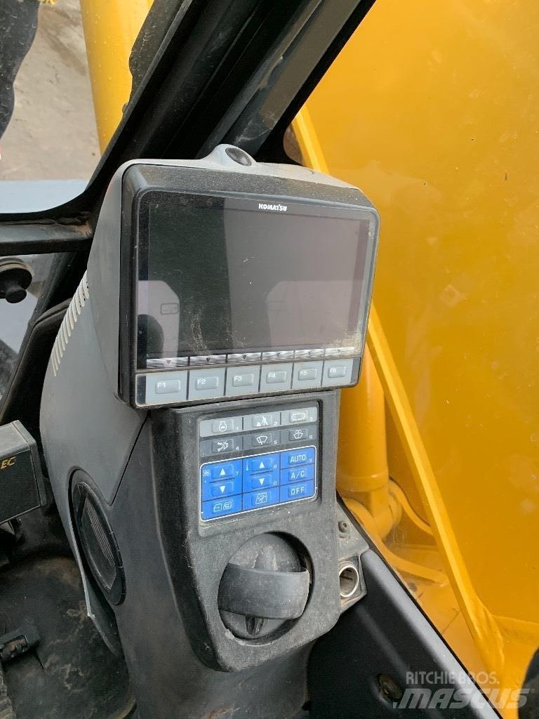 Komatsu 138 us -8 Kāpurķēžu ekskavatori