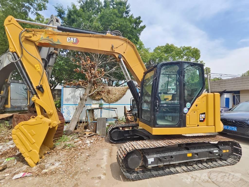 CAT 310 Kāpurķēžu ekskavatori