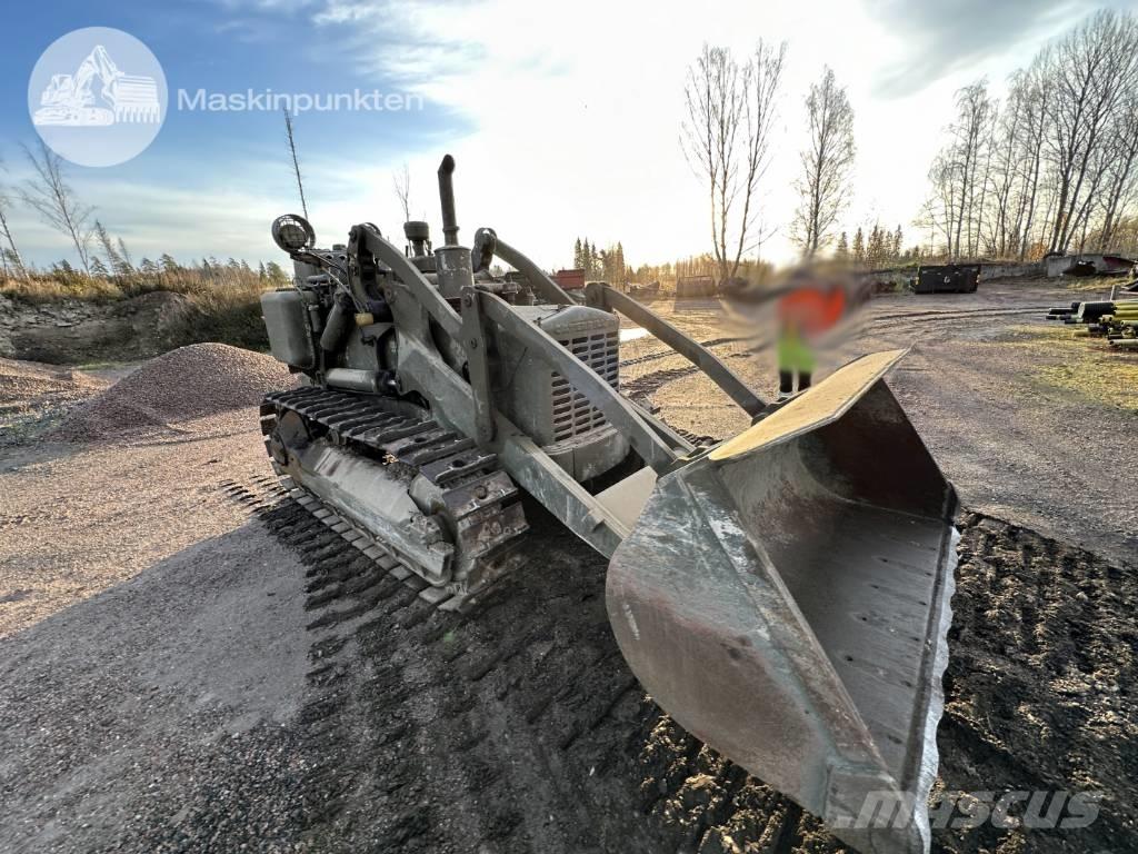 CAT 955 Kāpurķēžu iekrāvēji