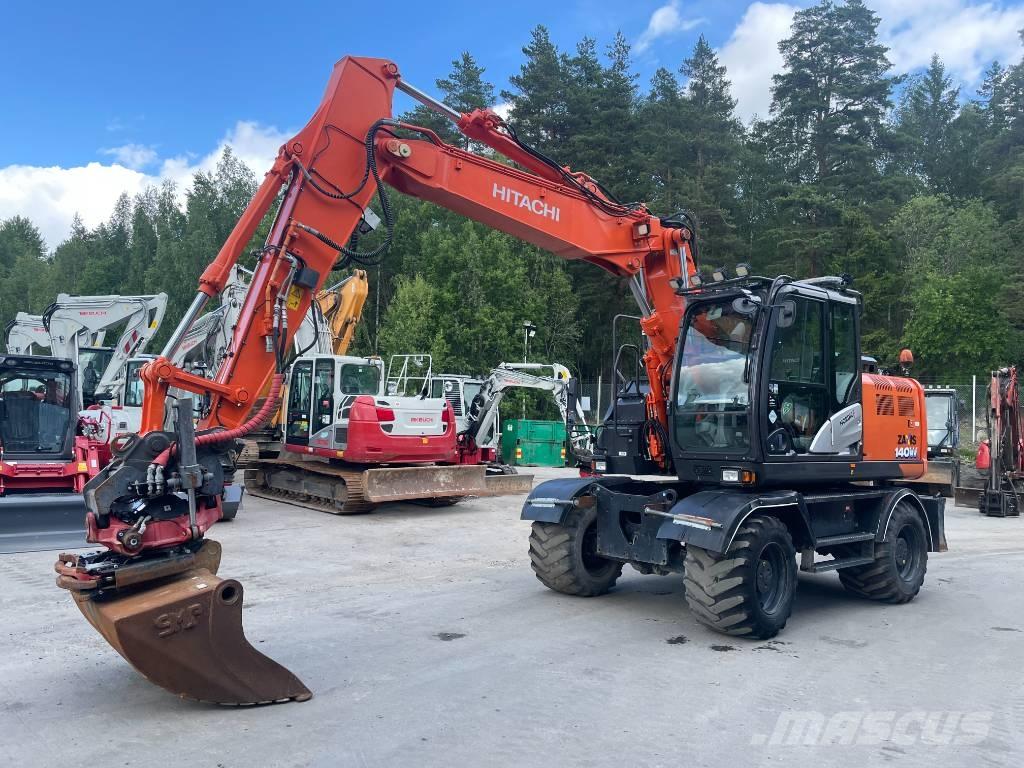 Hitachi 140W Ekskavatori uz riteņiem